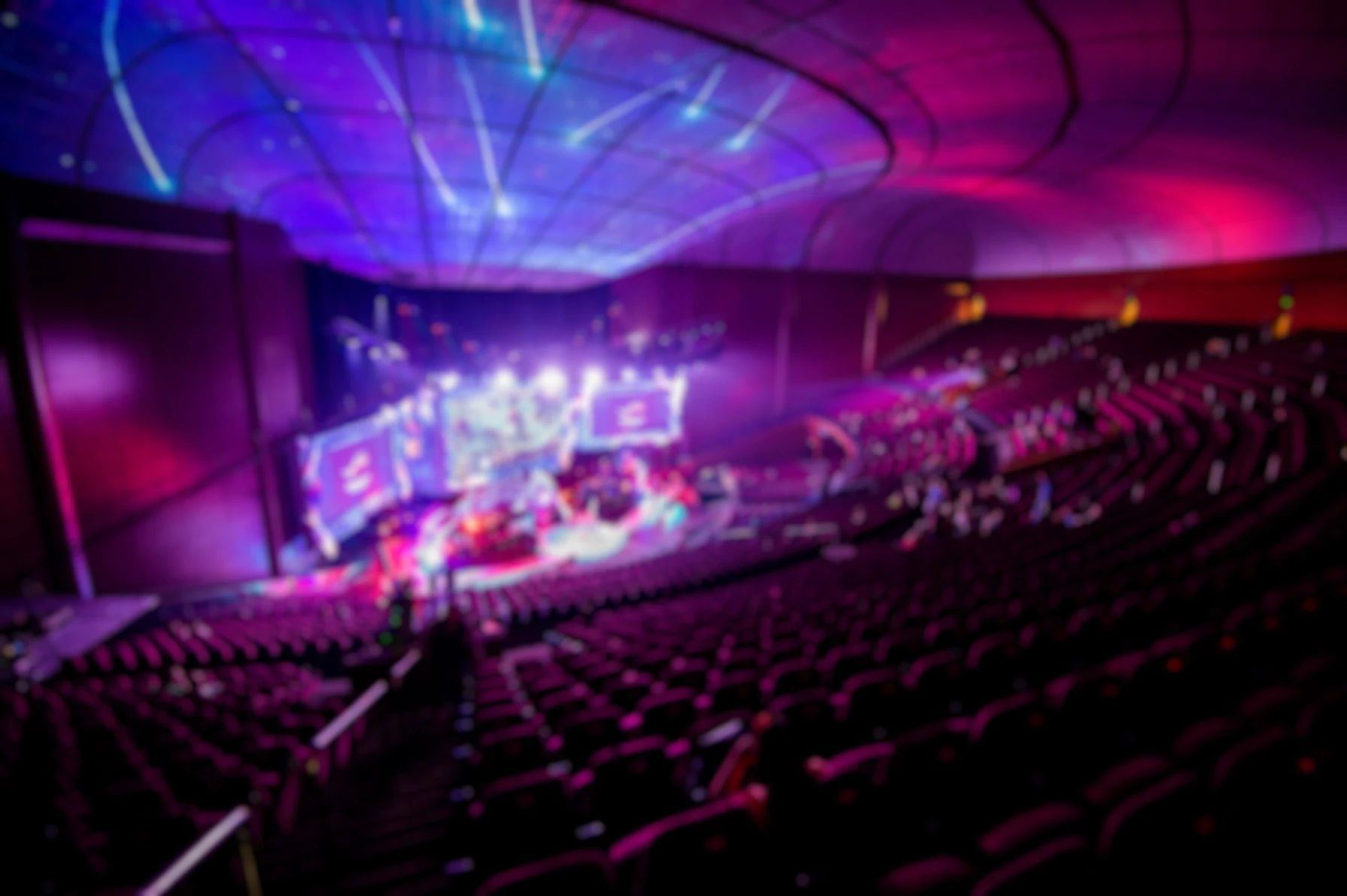 Concert hall interior with stage lighting